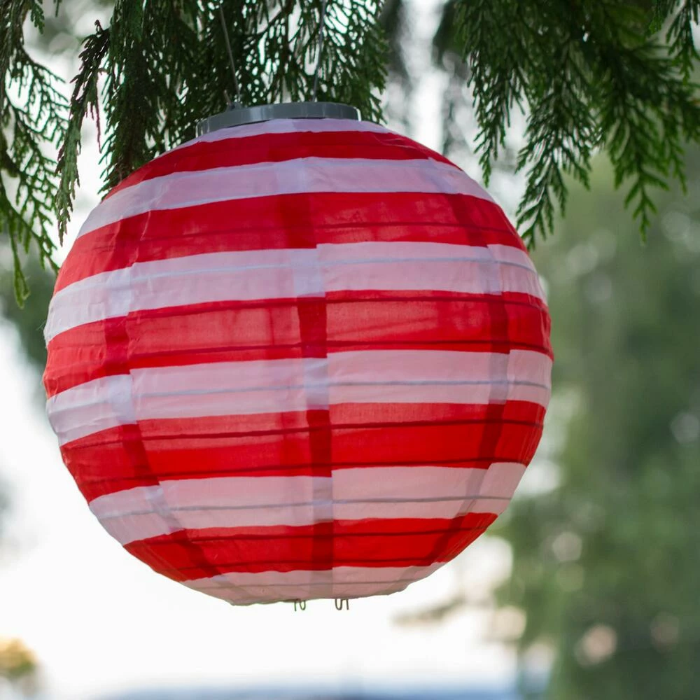 World Market Round Red and White Stripe Fabric Solar LED Lantern 4 World Market Round Red and White Stripe Fabric Solar LED Lantern - Image 2
